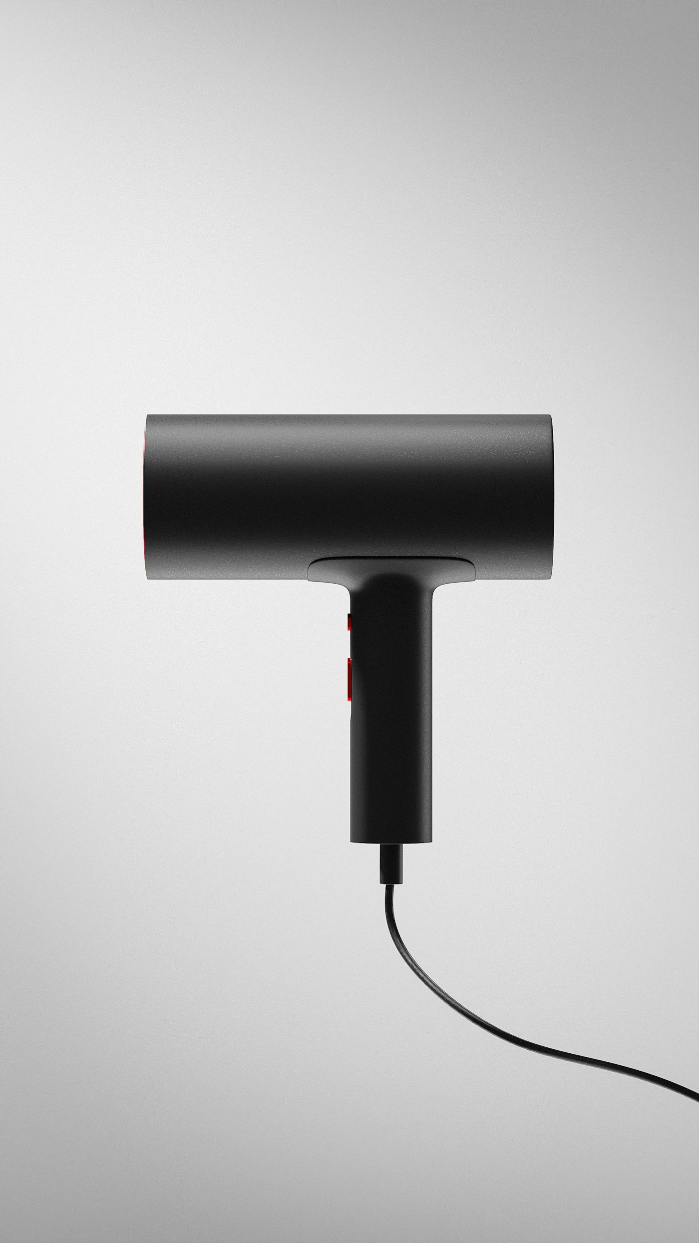Matte black hair dryer photographed against a clean neutral studio background