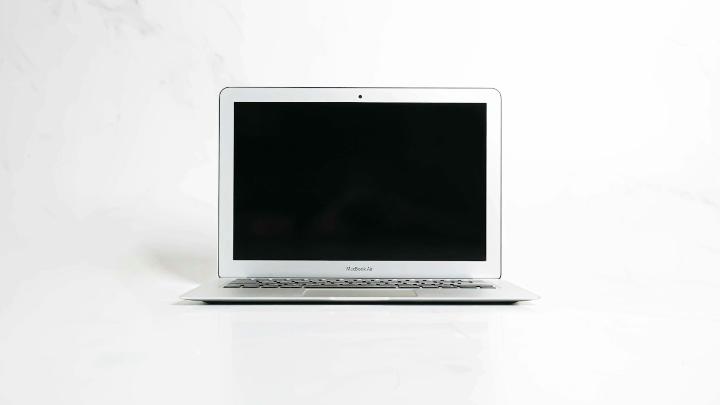 Silver MacBook Air photographed on a clean white studio background